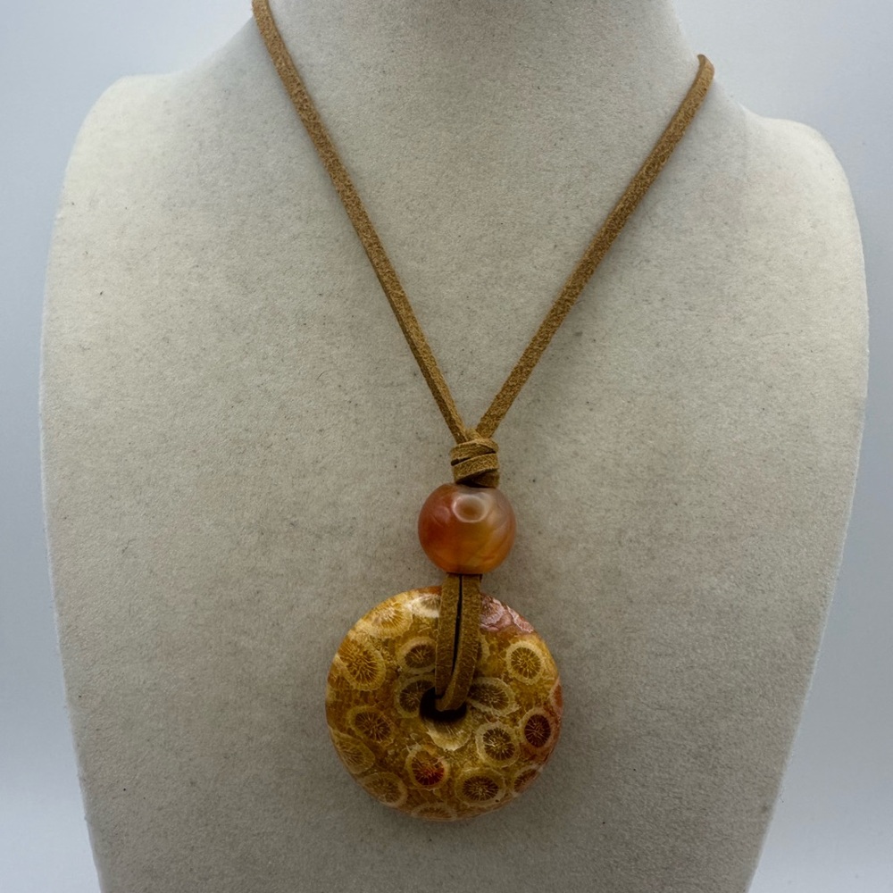 Brown and Tan Coral Fossil Donut Pendant Necklace on Brown Faux Suede - Picture 9 of 13
